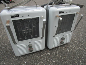 lot 117 image: A PAIR OF PORTABLE DAYTON HEATERS