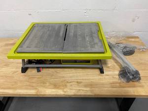 lot 6 image: RYOBI 7 in. 4.8 Amp Tabletop Tile Saw