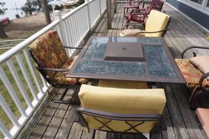lot 5 image: Glass Top Fire Pit Outdoor Patio Table With 4 Padded Chairs