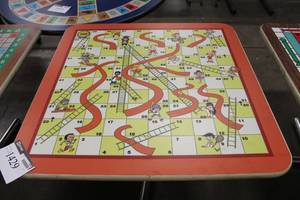 lot 1429 image: Chutes n Ladders Game Table