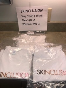SKINCLUSION NEW IN PACKAGE T-SHRITS. 2 LARGE MENS, 1 MEDIUM WOMENS
