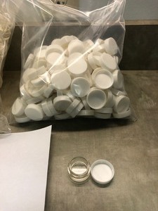 BAG OF 1 SAMPLE BOTTLES WITH CAPS