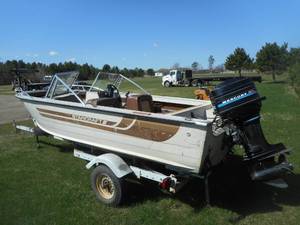 lot 1 image: 1982 Starcraft 160 16 with Shore Landr Trailer
