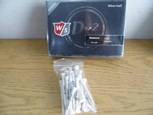 lot 137 image: New Wilson Golf Balls w Tees