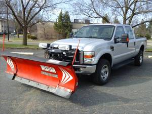 2008 Ford F-350 XLT Lariat Super Duty 4 Door Crew Cab Pickup Truck with Western Plow