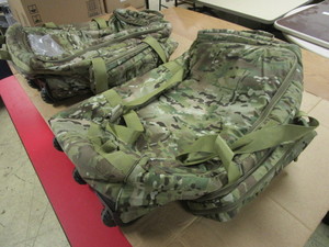 lot 226 image: MILITARY-ISSUED CAMO LUGGAGE, ON WHEELS, PADDED EXTERIOR SHELL