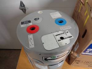 lot 22 image: Brand New AO Smith 12 Gallon Electric Water Heater
