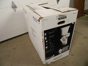 lot 49 image: New Kohler Highline Curve Toilet with Damage
