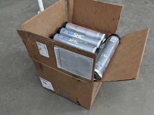 lot 26 image: Lot of (1) Case of Mobil Mobilith SHC 100 Lithium Complex Grease Red 14-oz. Cartridges