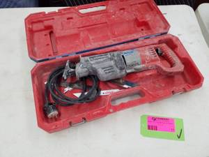 lot 11 image: Milwaukee Heavy Duty Sawzall with Case