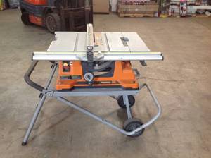 lot 39 image: RIDGID 10 in. Pro Jobsite Table Saw in used condition with stand