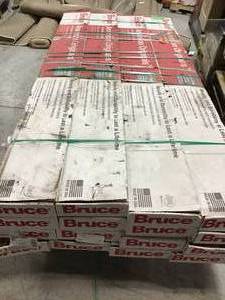 lot 42 image: Pallet whit 16 boxes Bruce American Originals Copper Dark Red Oak 34 in. T x 2-14 in. W x Varying L Solid Hardwood Flooring (20 sq. ft. case)