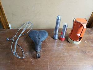 lot 64 image: Vintage Bike Seat, Clothes Hanger, Flashlights