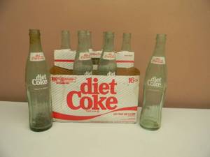 lot 39 image: VINTAGE 8 PACK 16 OZ. DIET COKE BOTTLES WITH CARRIER CASE - VERY COOL - GOOD CONDITION FOR AGE - RARE FIND - SEE PICTURES