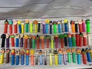 lot 6 image: Lot of 63 Pez Dispensers