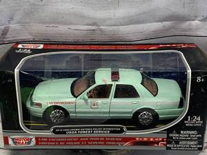 lot 75 image: Motor Max USDA Forest Service Police Car