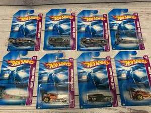 lot 99 image: Lot of 8 team Drag Racing Hot Wheels