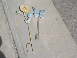 2 Outdoor Dcor 20 and 27 tall...