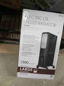 lot 5 image: 1,500-Watt Oil-Filled Radiant Elect...