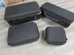 lot 84 image: 4 Assorted Zip Cases...