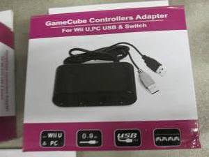 lot 92 image: 3 Game Cube Controllers Adapters...