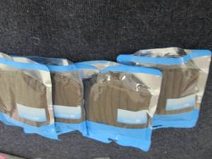 lot 99 image: 4 -8pks Furniture Leg Socks...