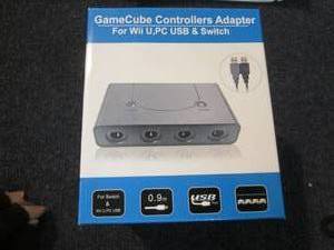 lot 115 image: 4 GameCube Controllers Adapters...