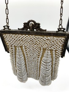 lot 107 image: Antique White Beaded Purse with Decorative Metal Frame