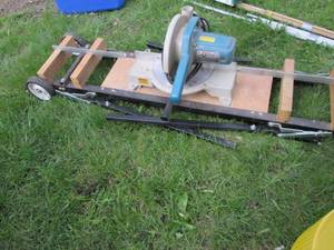 lot 101 image: Makita 10 Miter Chop Saw on Stand ...
