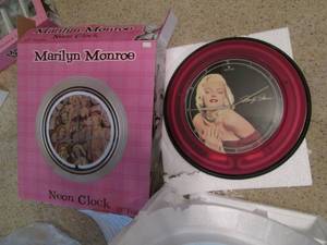 lot 229 image: 15 Frame Marilyn Monroe Neon Clock...