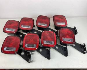 lot 101 image: Red Tail Lights with Brackets (Qty 8)