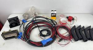 lot 109 image: Assorted Wiring Harnesses, Back Up Alarm, Exhausts, etc