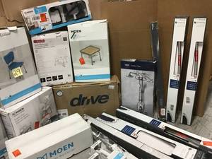 lot 29 image: Assorted pallet of Moen and Delta appliances which include chairs, tables and bathroom appliances ( all different conditions ) ( customer returns )