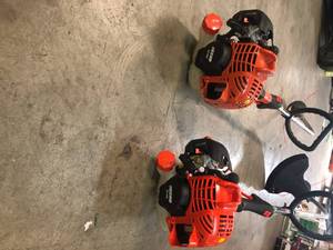 lot 24 image: SET OF 2 ECHO 21.2 cc Gas 2-Stroke Cycle Curved Shaft Trimmers ( in working condition )