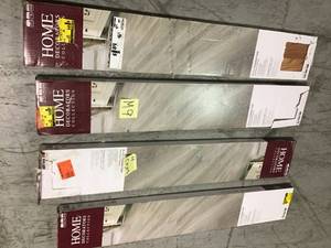 lot 52 image: Lot of 4 cases of Home Decorators Collection Coastal Oak 7.5 in. L x 47.6 in. W Luxury Vinyl Plank Flooring (24.74 sq. ft.  case)