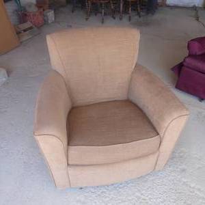 lot 57 image: Beige Swivel Rocking Chair