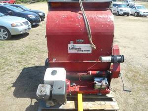 lot 3 image: MC Lawn Genie Pickup Mower