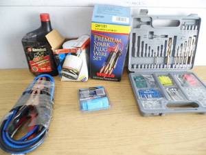 lot 57 image: Spark Plug Wire - Oil Filter - Bits