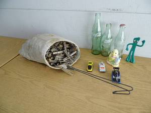 lot 65 image: Vintage Clothespins - Coke Bottles