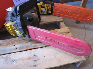 lot 807 image: McCULLOUGH CHAIN SAW WITH GUARD