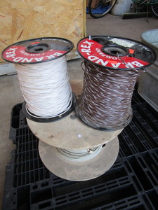 lot 834 image: SPOOL OF SOLID CORE WIRE AND SPOOLS OF STRANDED WIRE