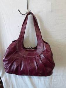 lot 2 image: Purple Coach Handbag