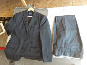 lot 63 image: Nautica Suit Coat (38R) And Dress Pants (32) With Garment Bag
