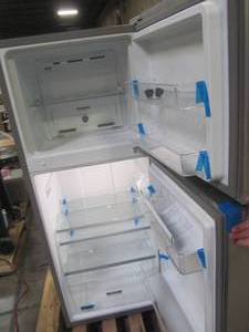 lot 335 image: Whirlpool 24 in. 11.6 cu. ft. Top Freezer Refrigerator in Fingerprint Resistant Stainless Finish, Counter Depth WRT112CZJZ