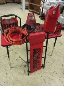 lot 724 image: MILWAUKEE MULTI-BAY CHARGER, TEAM MECHANIX CREEPER, JUMPER CABLES, MINI SHOP-VAC, MORE