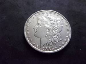 lot 7 image: 1886 Morgan Silver Dollar