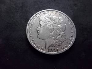 lot 14 image: 1894 O Morgan Silver Dollar
