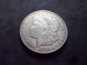 lot 21 image: 1921 D Morgan Silver Dollar