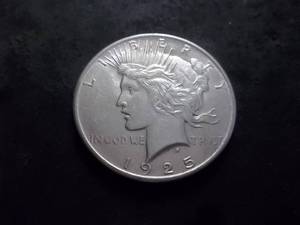lot 32 image: 1925 Peace Silver Dollar