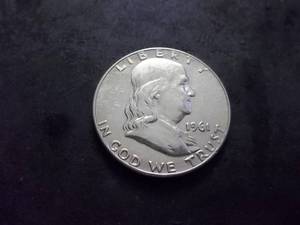 lot 142 image: 1961 D Franklin Half Dollar